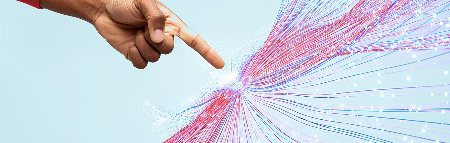 person’s finger pointing at a spot igniting streams of data and intelligence all around it