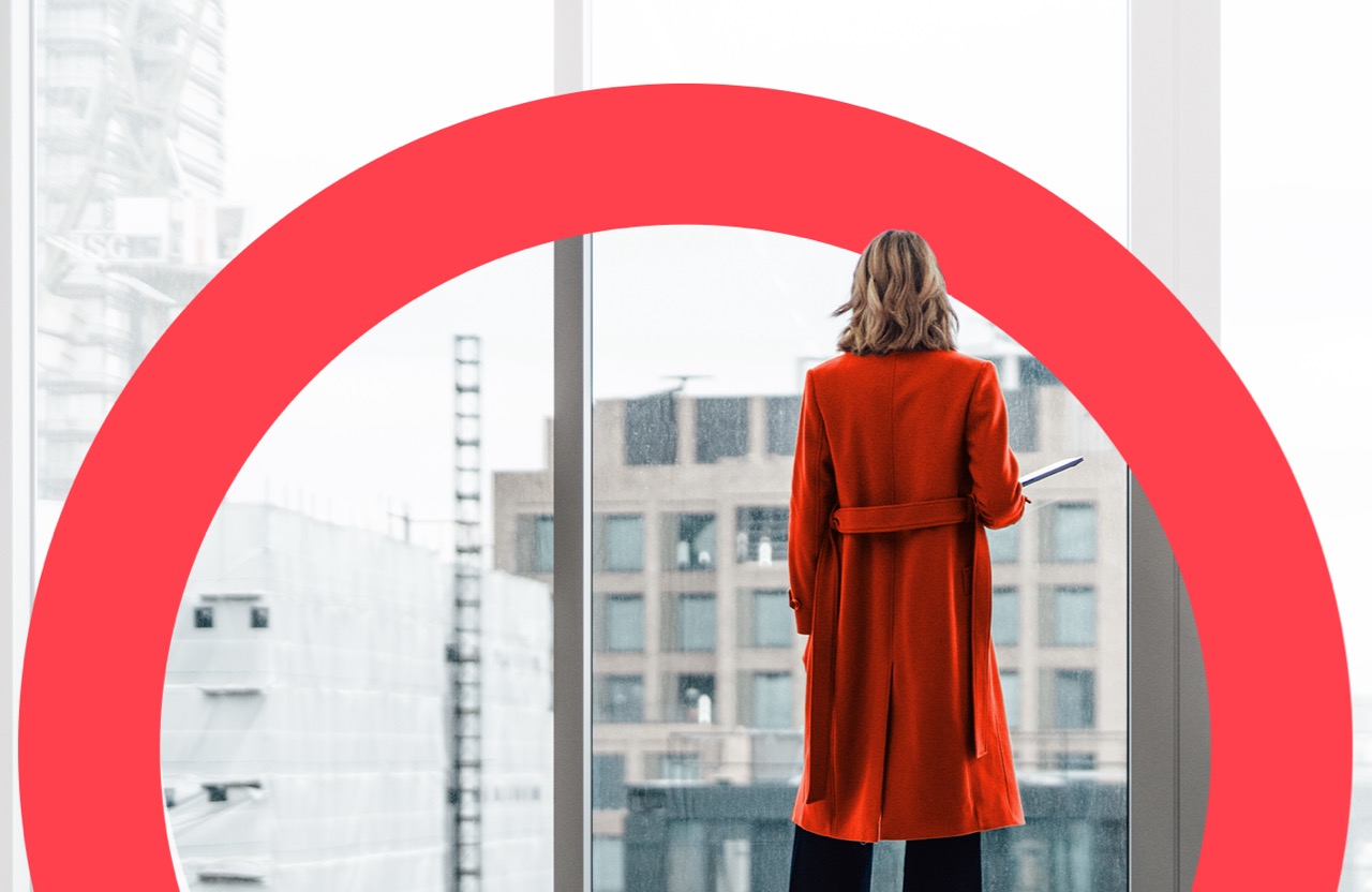 A woman looking out on a cityscape